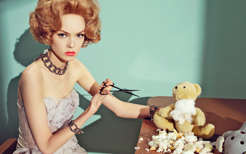 Sofia & Mauro shot of model cutting teddy bear