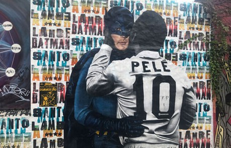 Batman stays watchful. Despite of the affection from Pelé